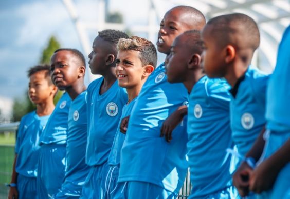 Young footballers from across the world at Manchester City course