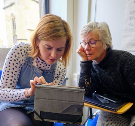 Two students using an iPad in BSC Oxford
